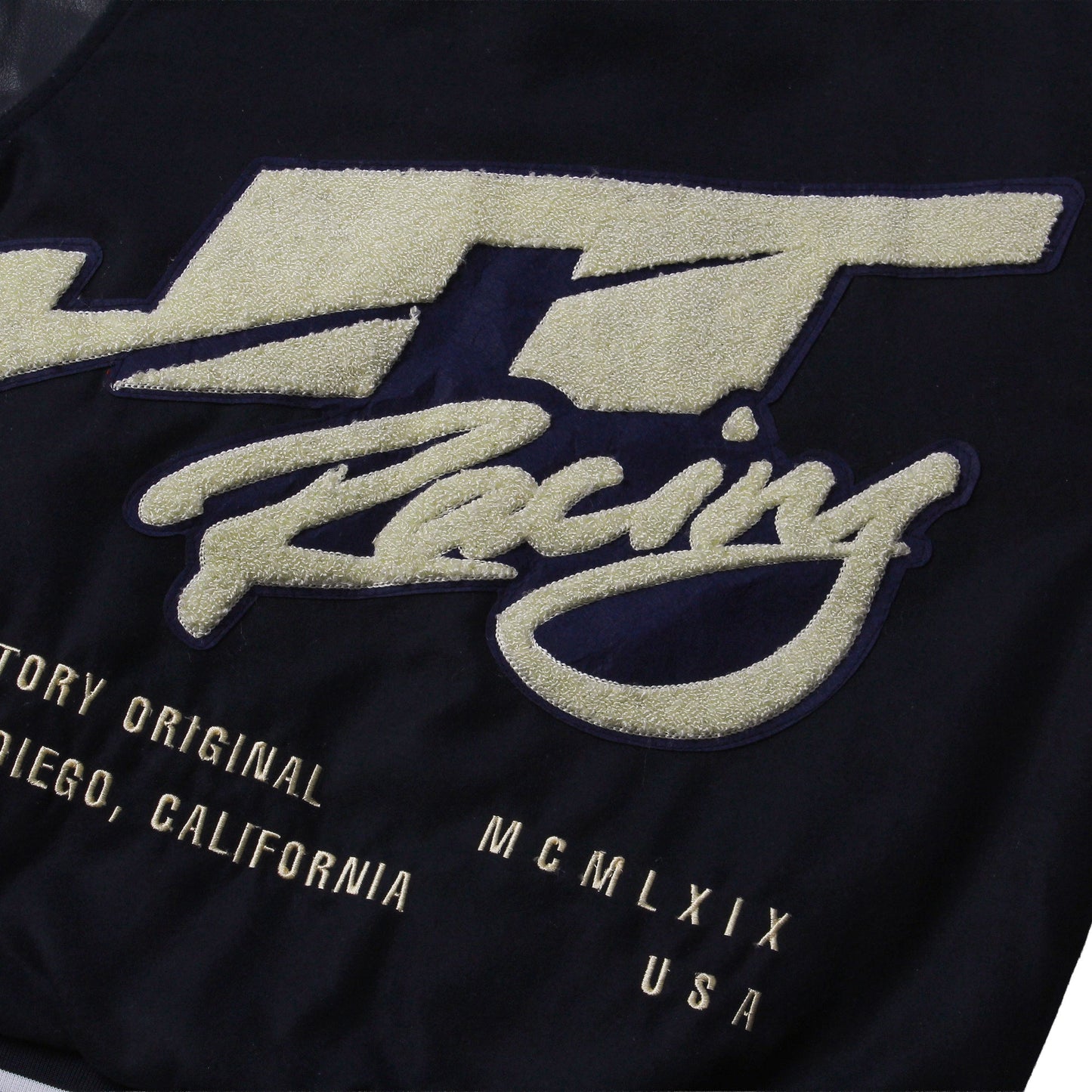 JT Racing navy varsity jacket back logo detail